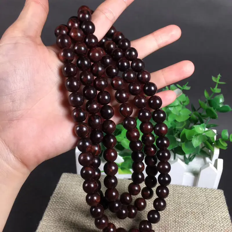 【海南黄花梨紫油梨1.0*108粒,重60克!沉水!同料一串!集瘤疤花、水波纹、“三高”材质、高油!高紫!高密度!一流的材质。玻璃质感超强。收藏价值高!】图2