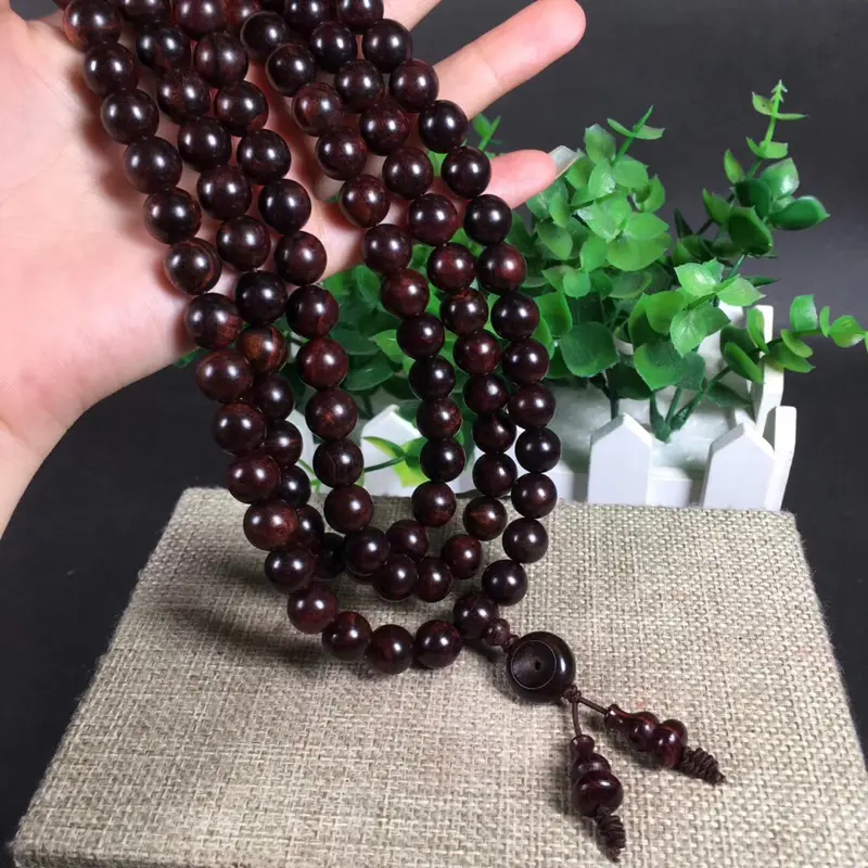 【海南黄花梨紫油梨1.0*108粒,重60克!沉水!同料一串!集瘤疤花、水波纹、“三高”材质、高油!高紫!高密度!一流的材质。玻璃质感超强。收藏价值高!】图5
