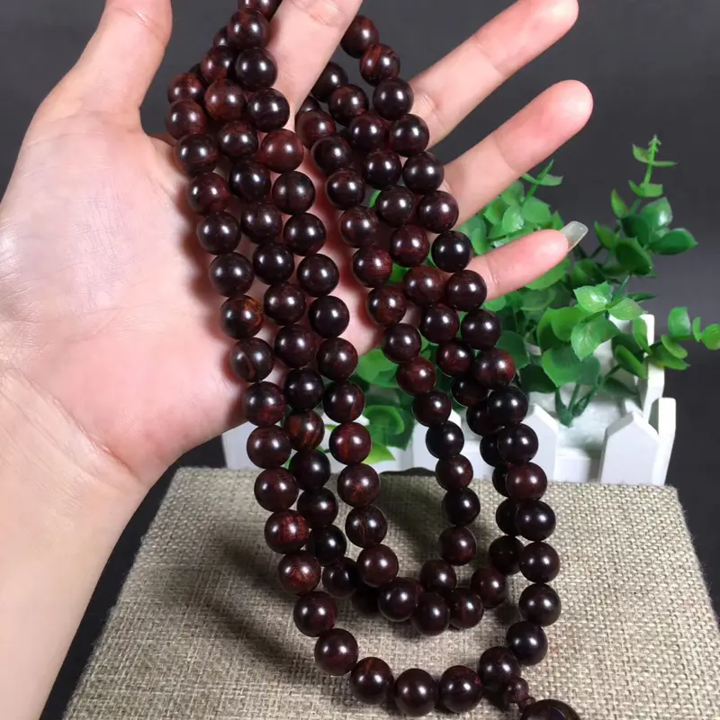 【海南黄花梨紫油梨1.0*108粒,重60克!沉水!同料一串!集瘤疤花、水波纹、“三高”材质、高油!高紫!高密度!一流的材质。玻璃质感超强。收藏价值高!】图7
