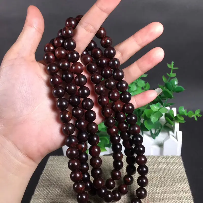 【海南黄花梨紫油梨1.0*108粒,重60克!沉水!同料一串!集瘤疤花、水波纹、“三高”材质、高油!高紫!高密度!一流的材质。玻璃质感超强。收藏价值高!】图8