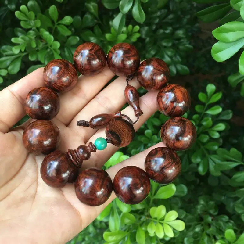 【海南黄花梨油梨 20mm手串 正心鬼脸纹 纹理殉丽 色泽柔和 荧光十足 玻璃底 收藏送礼佳品 重51.7克】图7