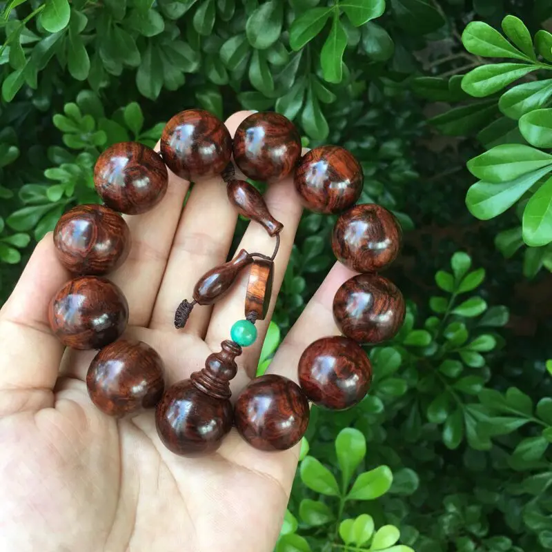 【海南黄花梨油梨 20mm手串 正心鬼脸纹 纹理殉丽 色泽柔和 荧光十足 玻璃底 收藏送礼佳品 重51.7克】图5