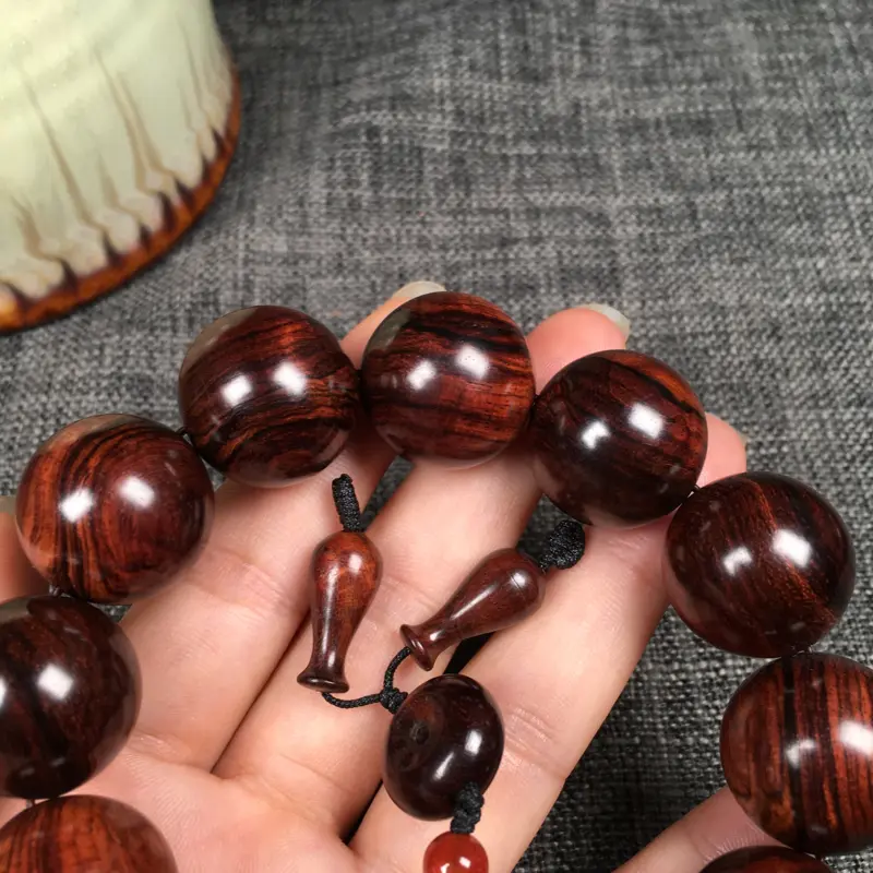 【海南黄花梨料油梨 20mm手串 顺纹+水波纹 线条流畅自然 花纹清晰 手感温润 玻璃底 秒沉水 重56.8g】图4