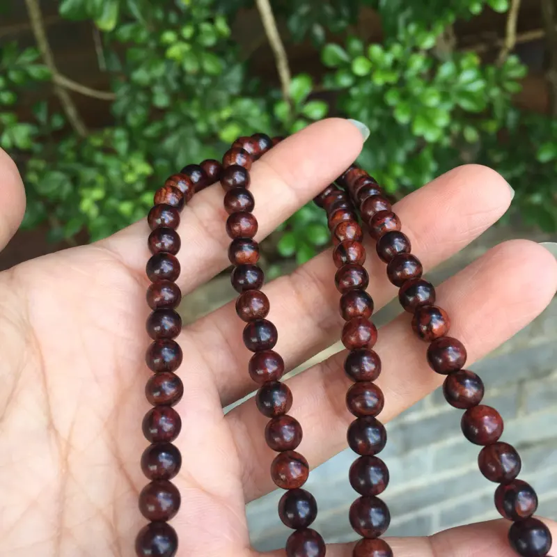 【海南黄花梨老油梨0.6/108颗精美小念珠,材质细腻光滑,颗颗精挑细选,十多年的纯手工艺,做工完美。克重30g,】图10