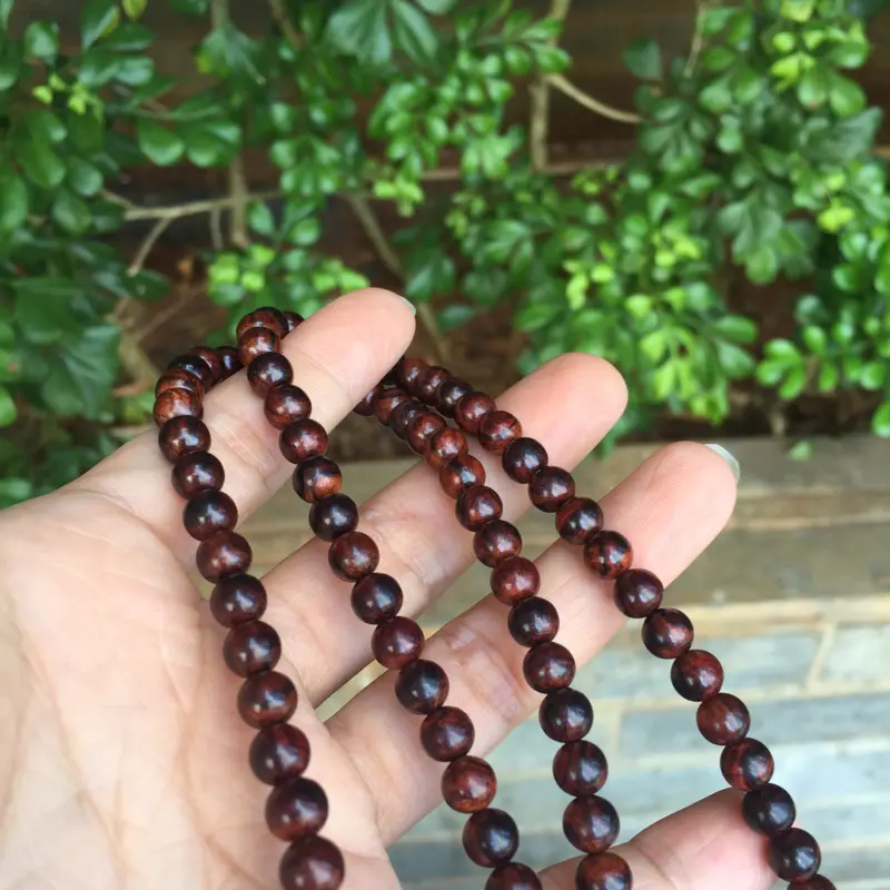 【海南黄花梨老油梨0.6/108颗精美小念珠,材质细腻光滑,颗颗精挑细选,十多年的纯手工艺,做工完美。克重30g,】图9