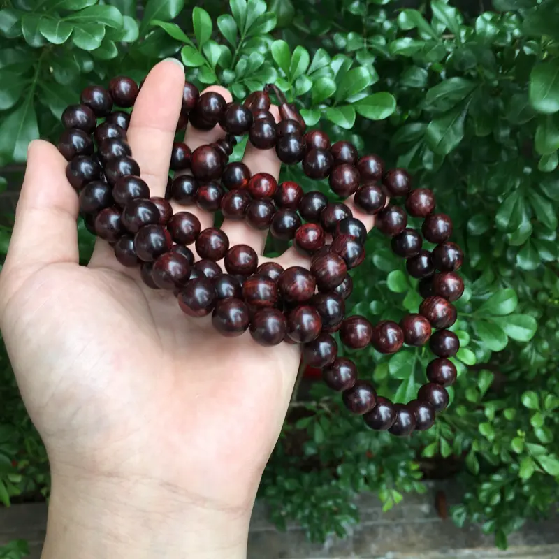 【海南黄花梨精品紫油梨念珠,同料制作12mm×108,纹理清晰,高油高密,底色干净,色泽均匀,把玩收藏送礼首选品,克重:102克,值得推荐】图2
