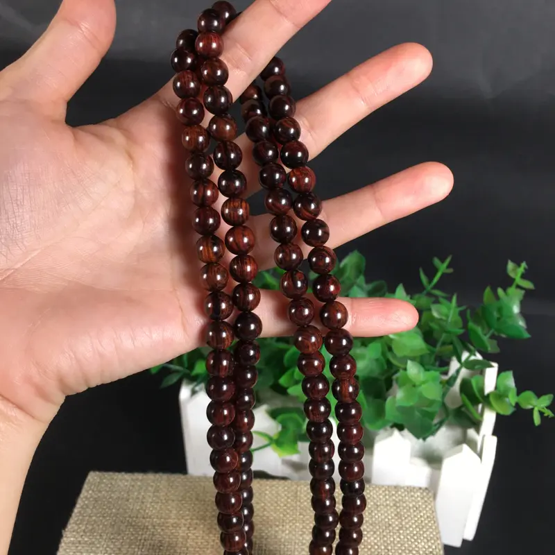 【新品;海南黄花梨紫油梨0.8念珠、108粒。沉水!集天眼、水波纹、“紫葡萄”材质。玻璃质感】图3