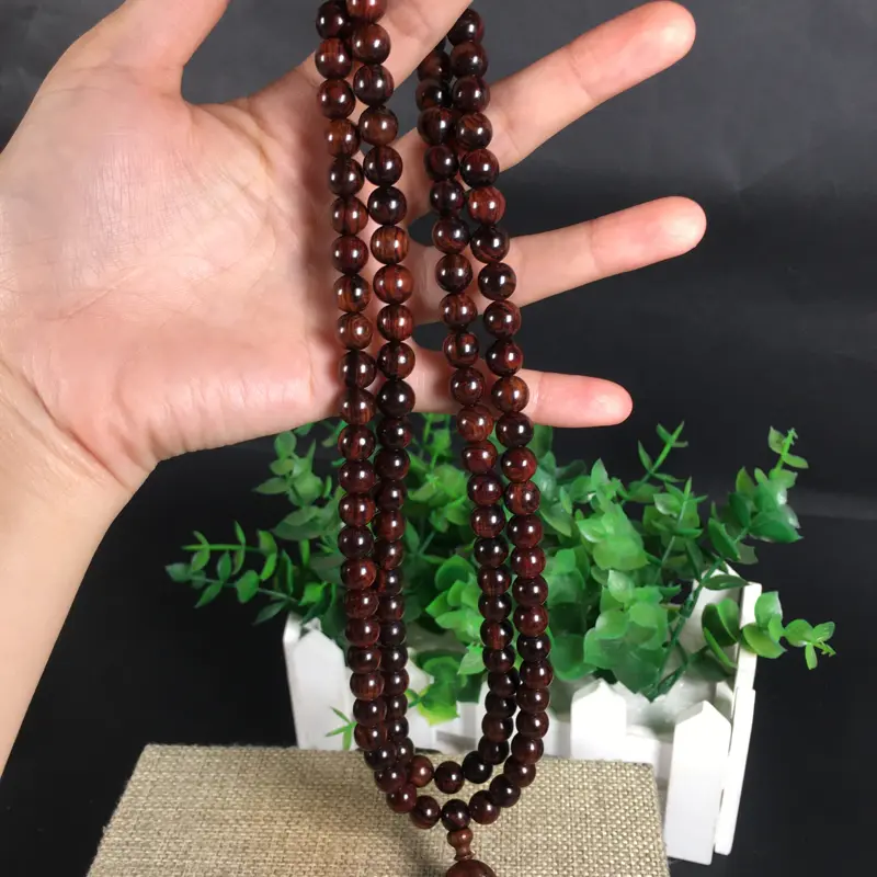 【新品;海南黄花梨紫油梨0.8念珠、108粒。沉水!集天眼、水波纹、“紫葡萄”材质。玻璃质感】图4