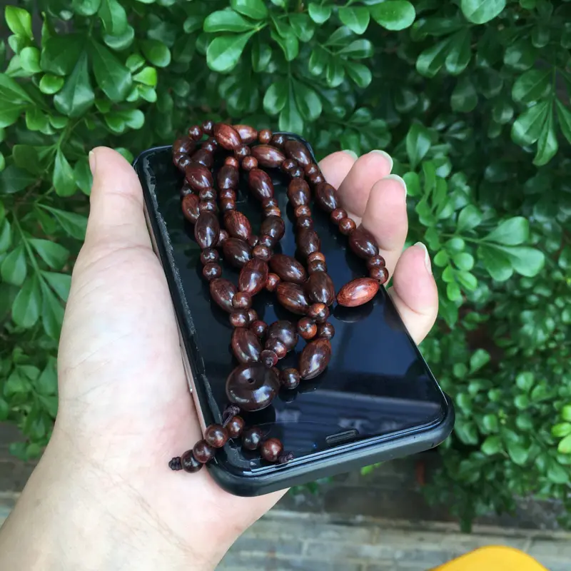 【海南黄花梨油梨橄榄珠项链,规格:14mm×8mm,大珠26粒,小珠54粒,同料制作,高油高密,底色干净,色泽均匀,把玩收藏送礼首选品,克重:20克。】图8