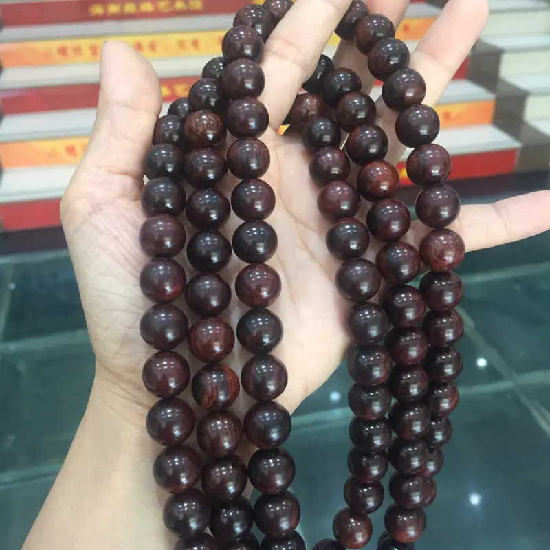 【海南黄花梨霸王岭紫油梨1.2/108颗精美念珠,材质一流,质感细腻光滑,顺纹纹路,色泽典雅高贵,象征着身份尊严,克重104.8g】图7