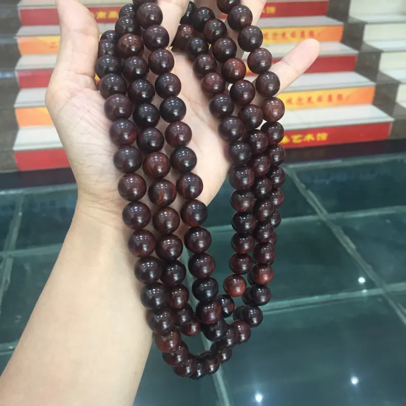 【海南黄花梨霸王岭紫油梨1.2/108颗精美念珠,材质一流,质感细腻光滑,顺纹纹路,色泽典雅高贵,象征着身份尊严,克重104.8g】图5