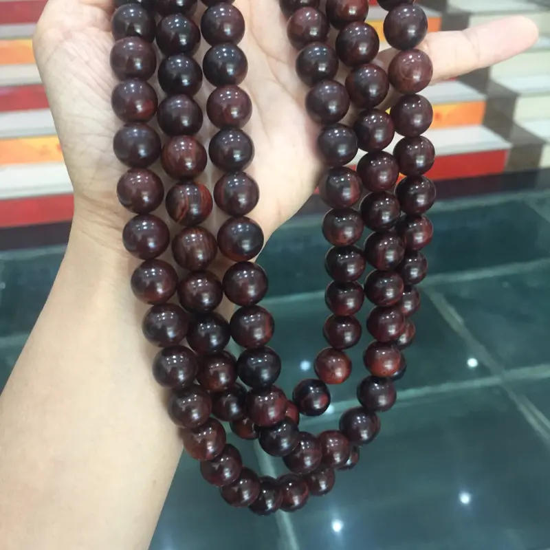 【海南黄花梨霸王岭紫油梨1.2/108颗精美念珠,材质一流,质感细腻光滑,顺纹纹路,色泽典雅高贵,象征着身份尊严,克重104.8g】图6