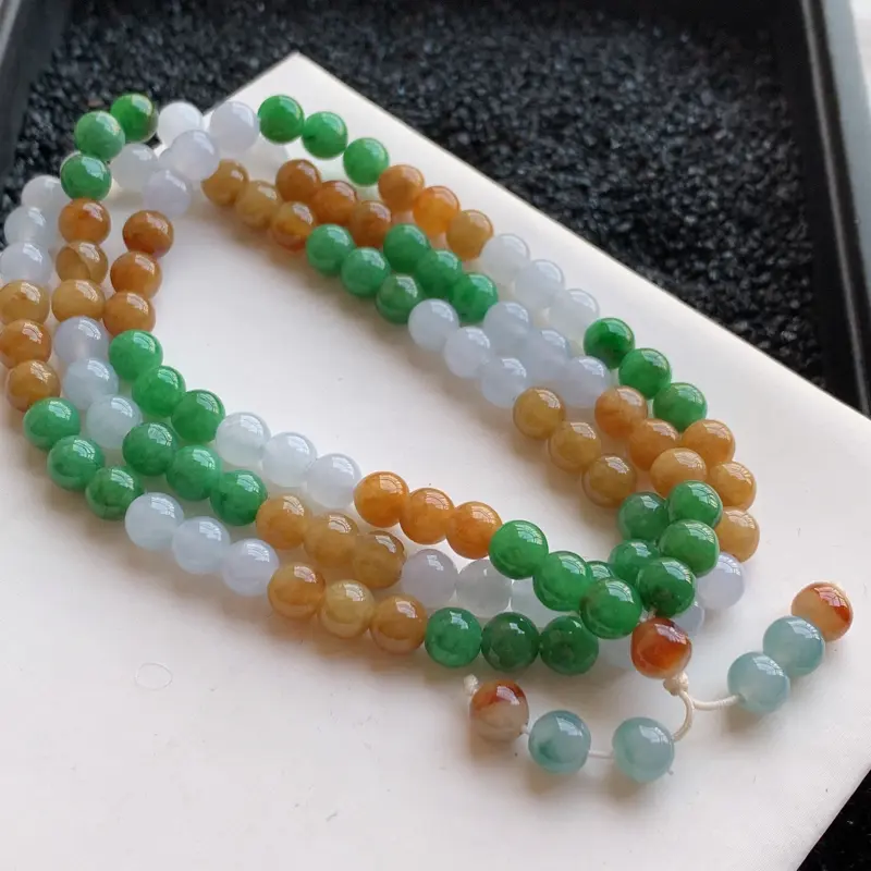 【🙏缅甸天然翡翠A货 108颗冰润三彩圆珠项链,克重65.37,尺寸:7,寓意峰回路转,圆圆满满,财富越聚越多,福气越大,质地细腻,圆润饱满,三彩颜色艳丽,颗颗精挑细选,完美度高,可当毛衣链,佩戴效果落落大方!性价比高!】图1