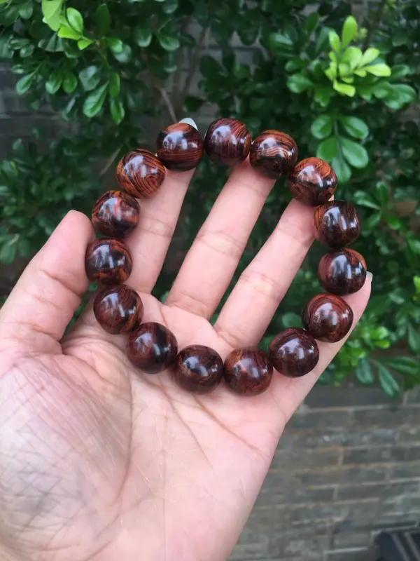 【海南黄花梨老油梨15×15老型珠,材质细腻光滑,纹理清晰自然,克重28.4g】图2