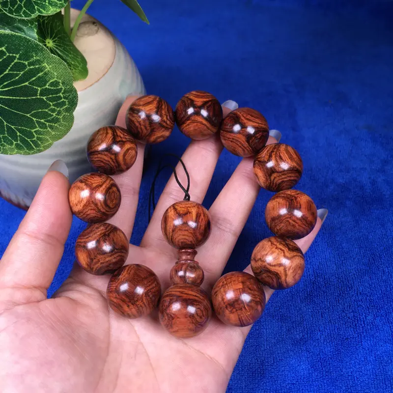 【海南黄花梨糠梨 20mm/12颗对眼X纹 颗颗圆润饱满 颜色均匀 线条流畅自然 重45.1g】图8