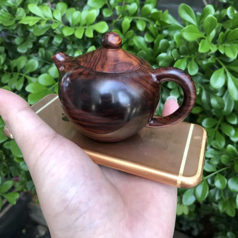 【海南黄花梨,紫油梨(茶壶),纹理清晰,底色干净,色泽均匀,线条美,盘玩收藏品,规格:壶经66mm,长96mm,69mm,135克,值得推荐!】图10