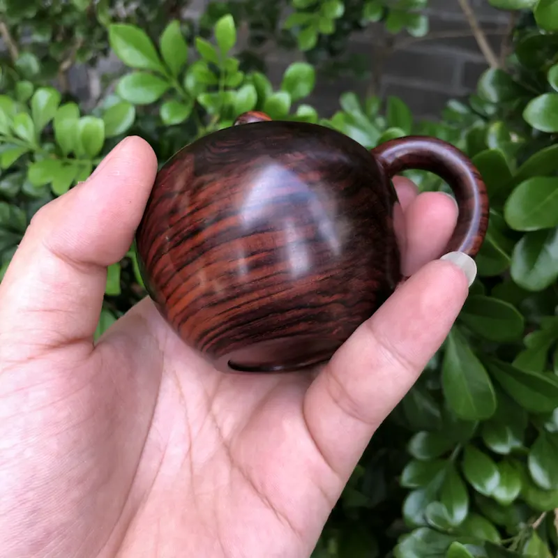 【海南黄花梨,紫油梨(茶壶),纹理清晰,底色干净,色泽均匀,线条美,盘玩收藏品,规格:壶经66mm,长96mm,69mm,135克,值得推荐!】图2