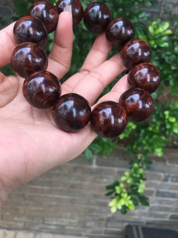 【海南黄花梨紫油全鬼眼对眼2.0规格手串,材质细腻饱满圆润,底色干净透亮,克重53g】图8