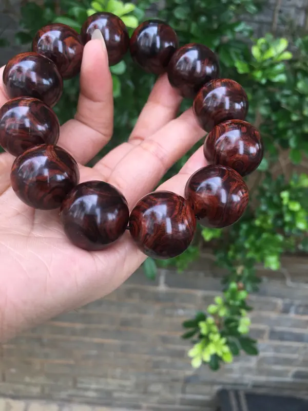 【海南黄花梨紫油全鬼眼对眼2.0规格手串,材质细腻饱满圆润,底色干净透亮,克重53g】图10