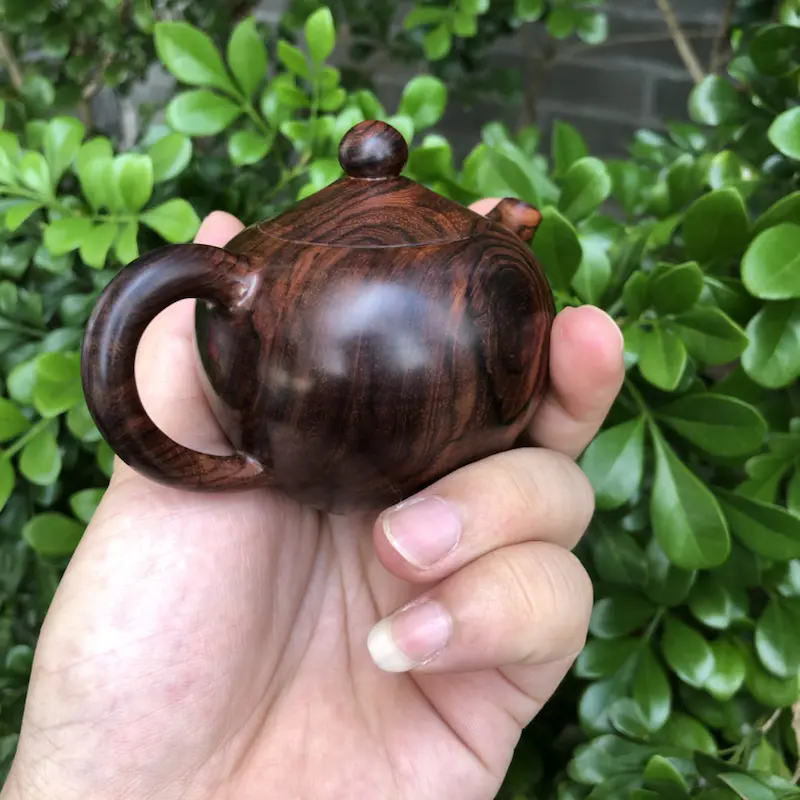【海南黄花梨,紫油梨(茶壶),纹理清晰,底色干净,色泽均匀,线条美,盘玩收藏品,规格:壶经66mm,长96mm,69mm,135克,值得推荐!】图4