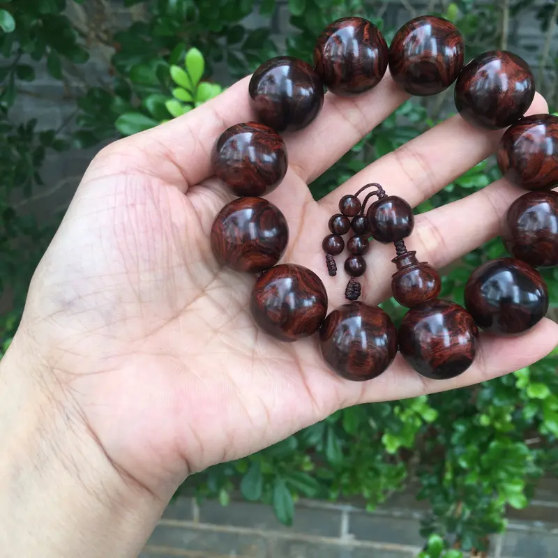 【海南黄花梨紫油全鬼眼对眼2.0规格手串,材质细腻饱满圆润,底色干净透亮,克重53g】图5