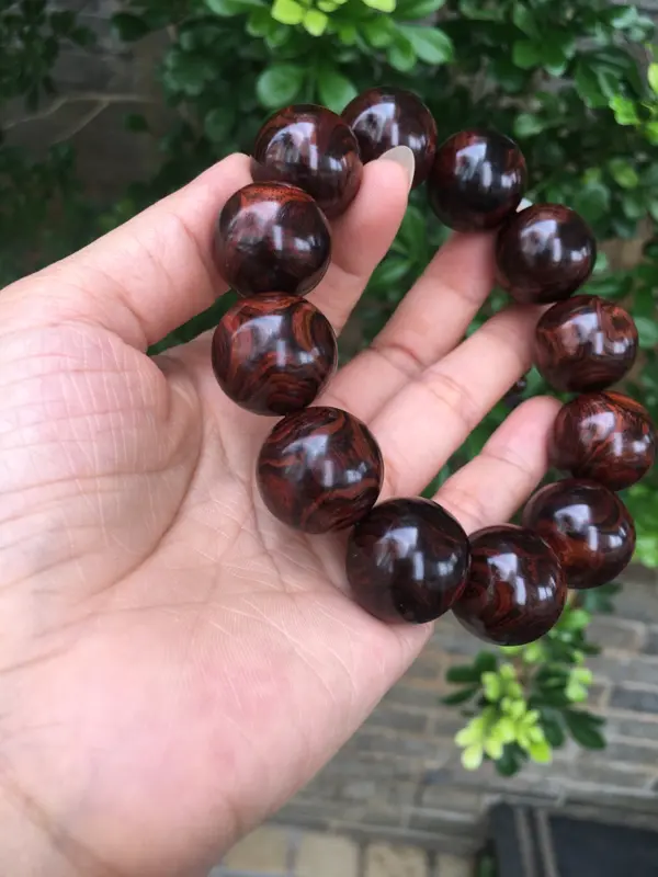【海南黄花梨紫油全鬼眼对眼2.0规格手串,材质细腻饱满圆润,底色干净透亮,克重53g】图9