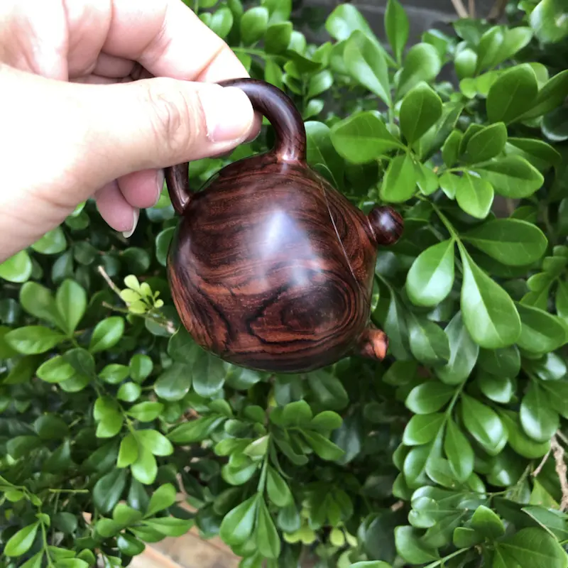 【海南黄花梨,紫油梨(茶壶),纹理清晰,底色干净,色泽均匀,线条美,盘玩收藏品,规格:壶经66mm,长96mm,69mm,135克,值得推荐!】图5