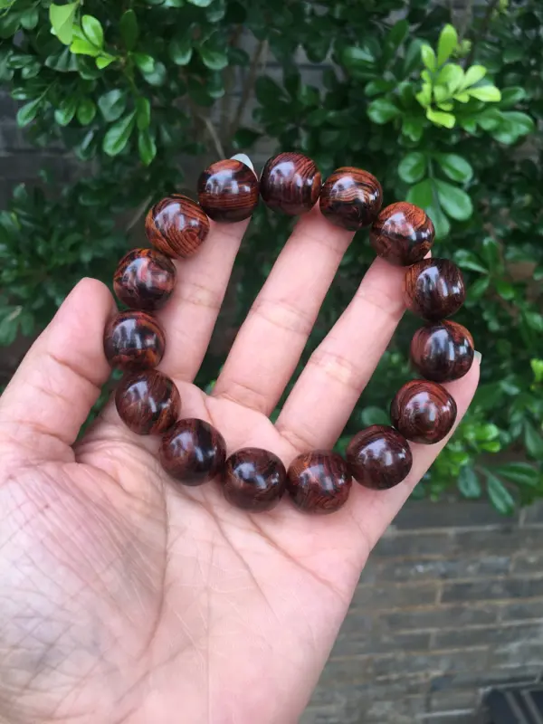 【海南黄花梨老油梨15×15老型珠,材质细腻光滑,纹理清晰自然,克重28.4g】图3