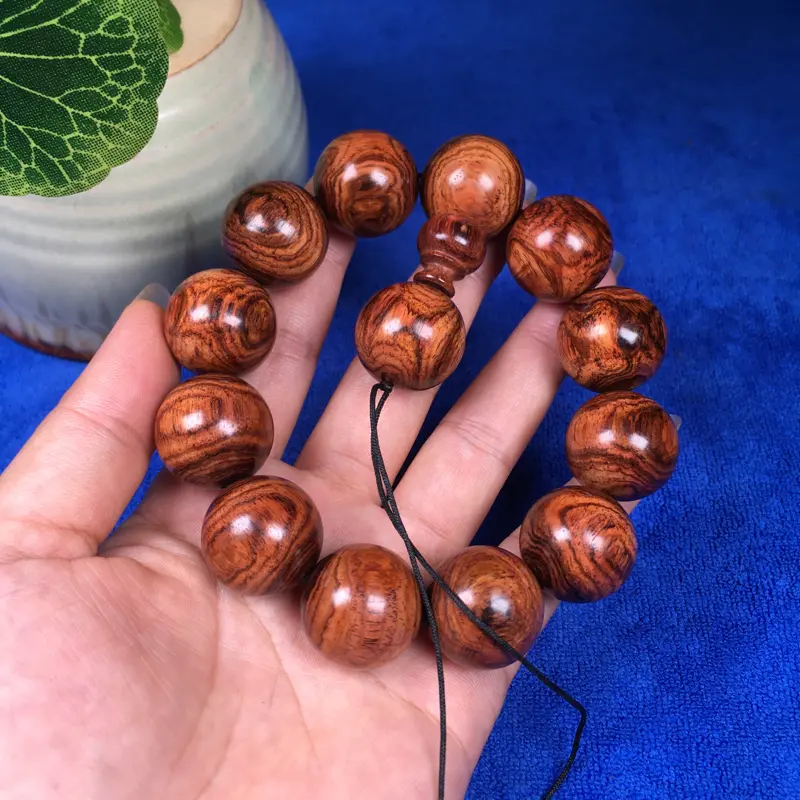 【海南黄花梨糠梨 20mm/12颗对眼X纹 颗颗圆润饱满 颜色均匀 线条流畅自然 重45.1g】图10