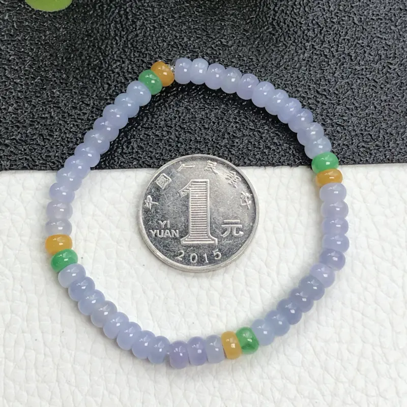 糯种紫罗兰翡翠珠链手串      直径5.5毫米    质地细腻     色彩鲜艳      编号A2732500